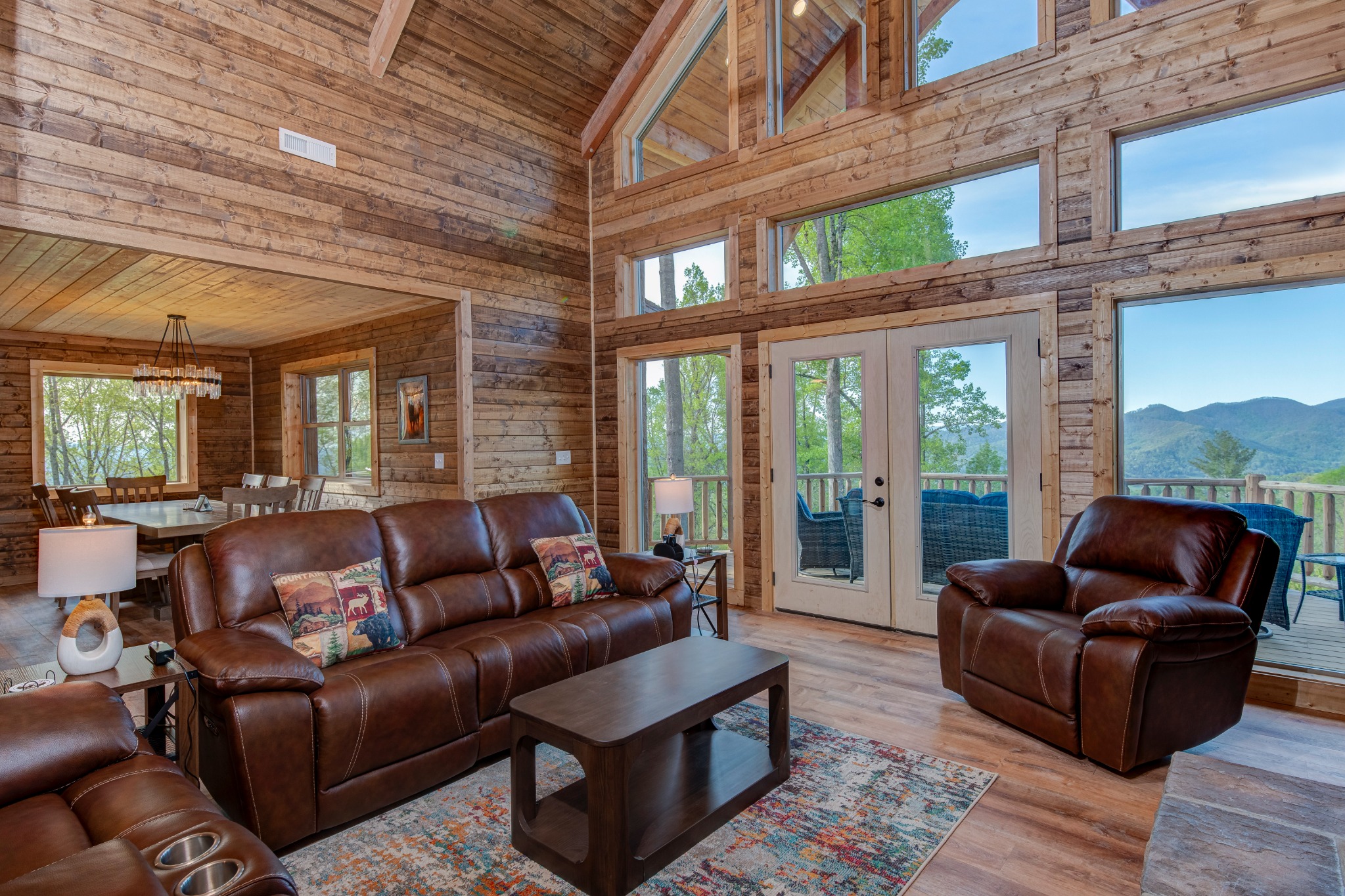 Great room with windows facing the mountain view